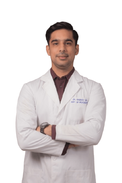 Portrait of Dr. Raghav Oza, a professional psychiatrist in Indore, wearing a white medical coat.